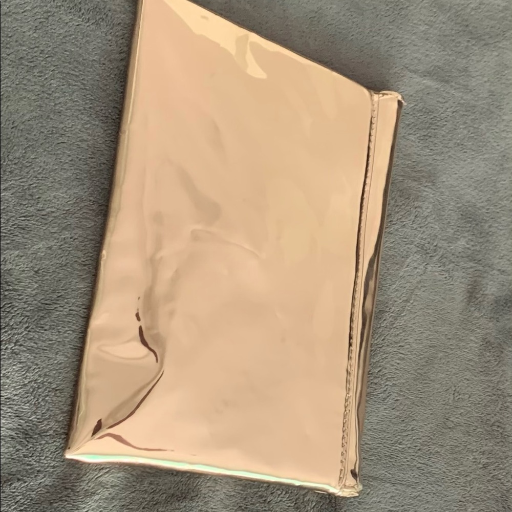 Rose gold mirror/reflector like purse /clutch.